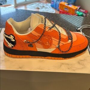 Orange Low-Top Sneakers with Chain Accent